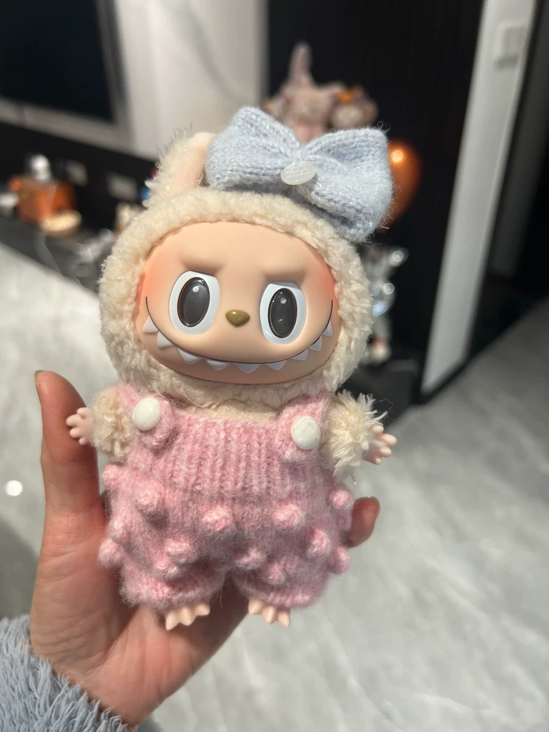 Adorable Labubu Doll in Cozy Knit Outfit – Soft Pink Jumper with Pom-Poms & Bow - Image 4
