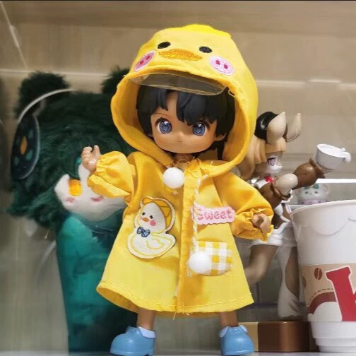 Charming Yellow Duck-Themed Raincoat for OB11 Dolls – Stylish & Durable BJD Accessory - Image 1