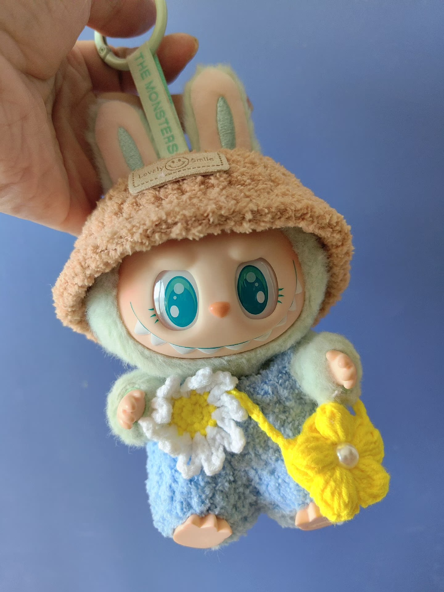 Charming Labubu Spring Outfit: Bunny Hat, Floral Blue Ensemble & Yellow Handbag for Playful Style - Image 1