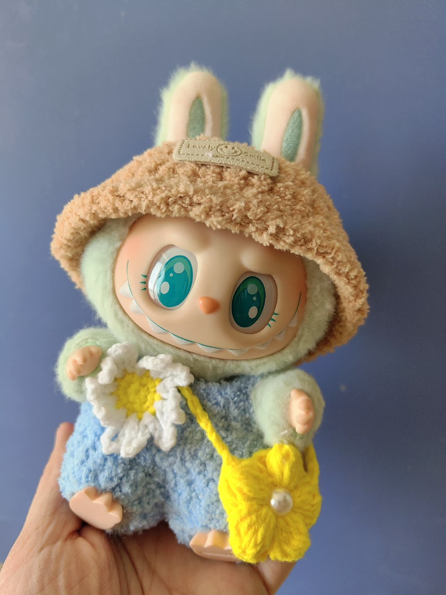 Charming Labubu Spring Outfit: Bunny Hat, Floral Blue Ensemble & Yellow Handbag for Playful Style - Image 2