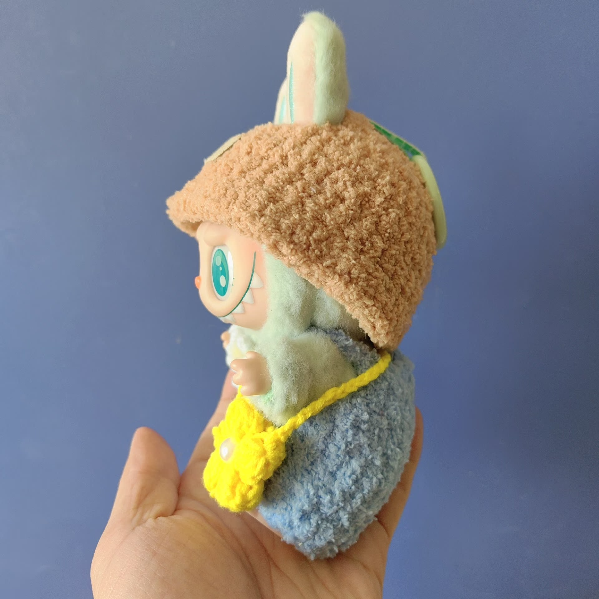 Charming Labubu Spring Outfit: Bunny Hat, Floral Blue Ensemble & Yellow Handbag for Playful Style - Image 7
