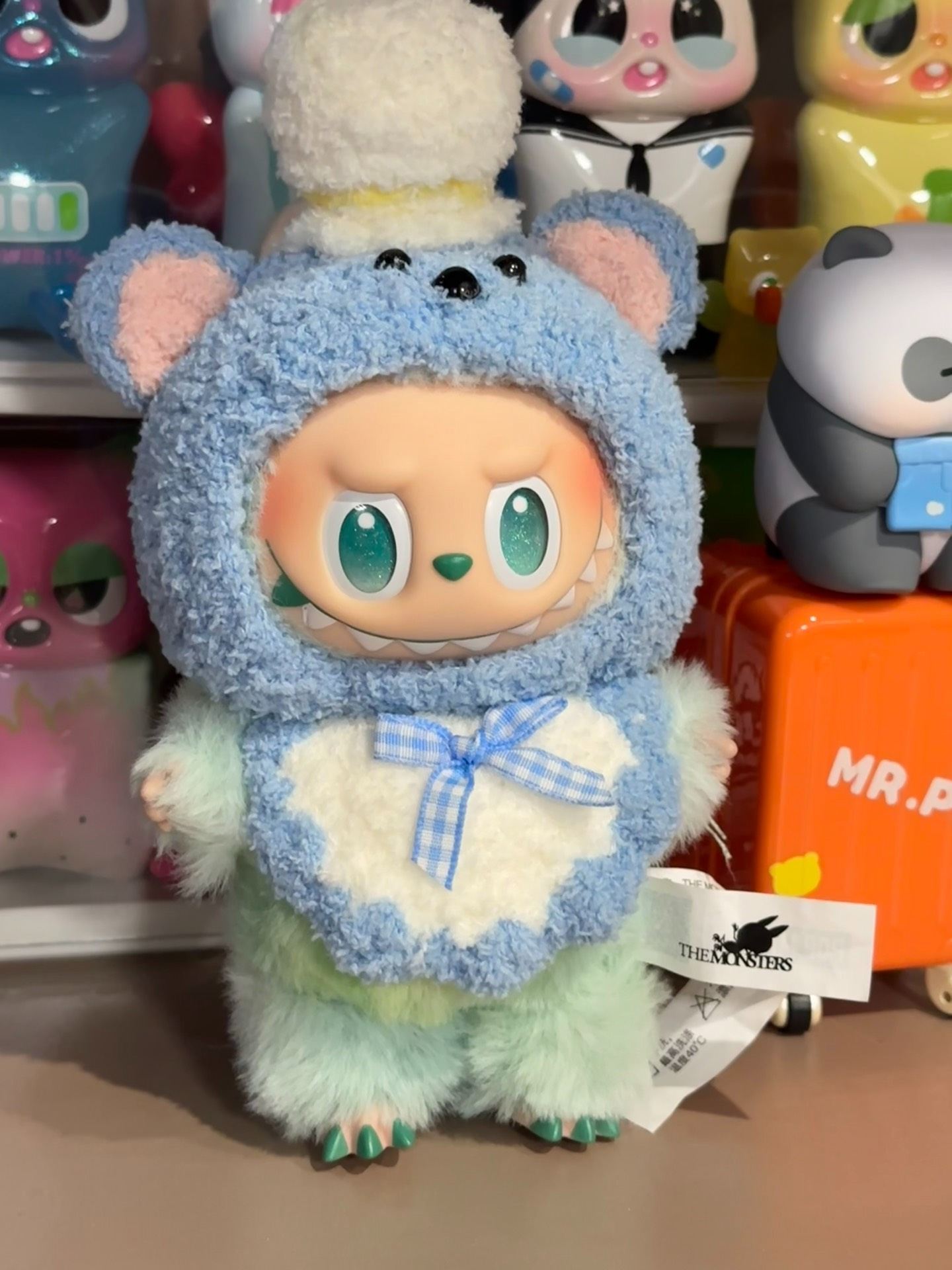 Adorable Plush Labubu Doll in Cozy Teddy Bear Outfit – Blue & White Collectible with Hat & Bow Tie - Image 3