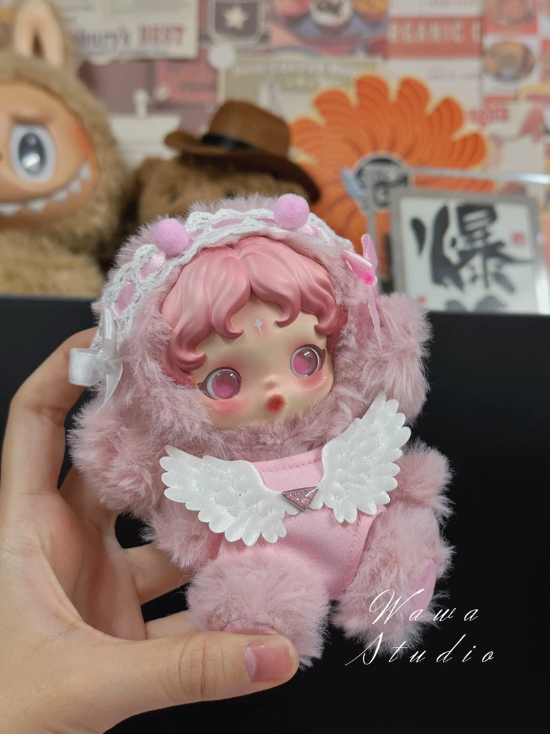 Whimsical Skullpanda Doll Outfit: Pastel Pink Plush Ensemble with Wings & Sparkling Gemstone - Image 3