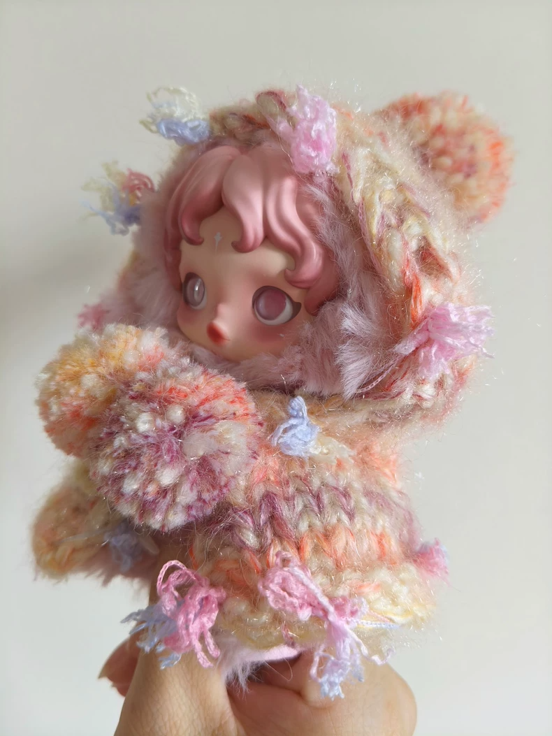 Whimsical Skullpanda Hooded Cloak: Vibrant Crochet Doll Outfit for Collectors - Image 1