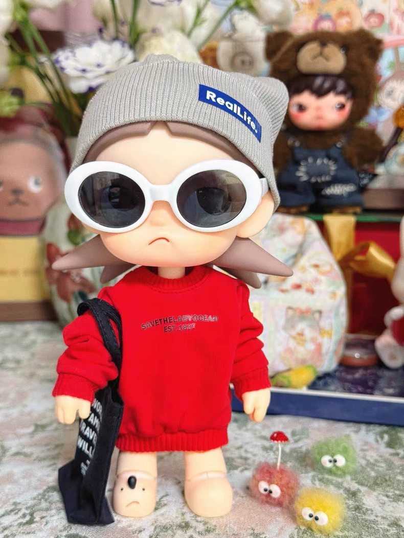 Zsiga BJD 1/8 Outfit: Stylish Red Sweater, Gray Beanie, Black Bag & White Sunglasses – Premium Quality & Modern Design - Image 1