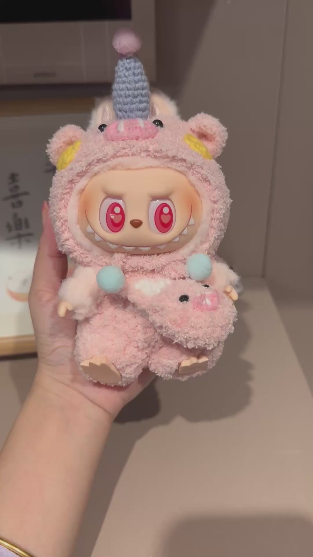 Adorable LABUBU Doll Outfit – Pink Unicorn Onesie with Hood & Pig Accessory - Video 1