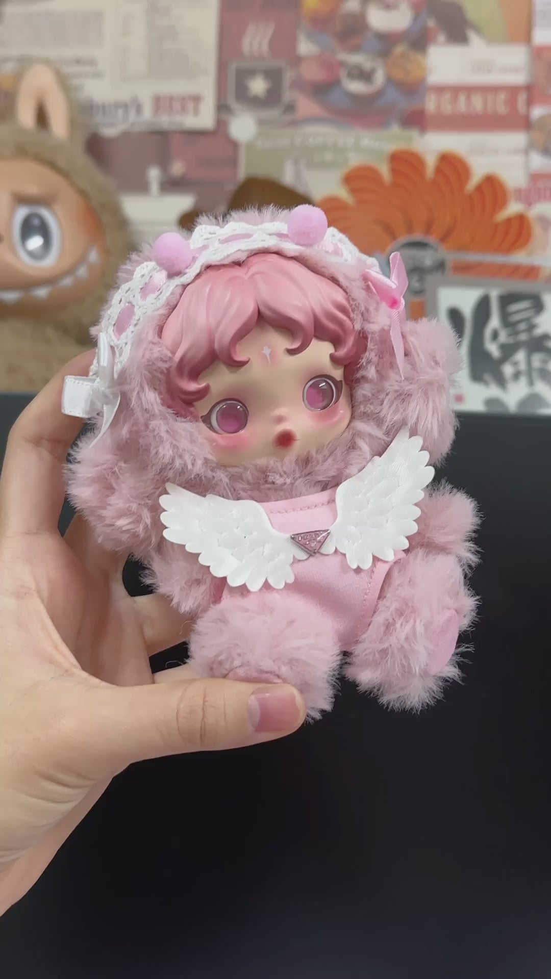 Whimsical Skullpanda Doll Outfit: Pastel Pink Plush Ensemble with Wings & Sparkling Gemstone - Video 1